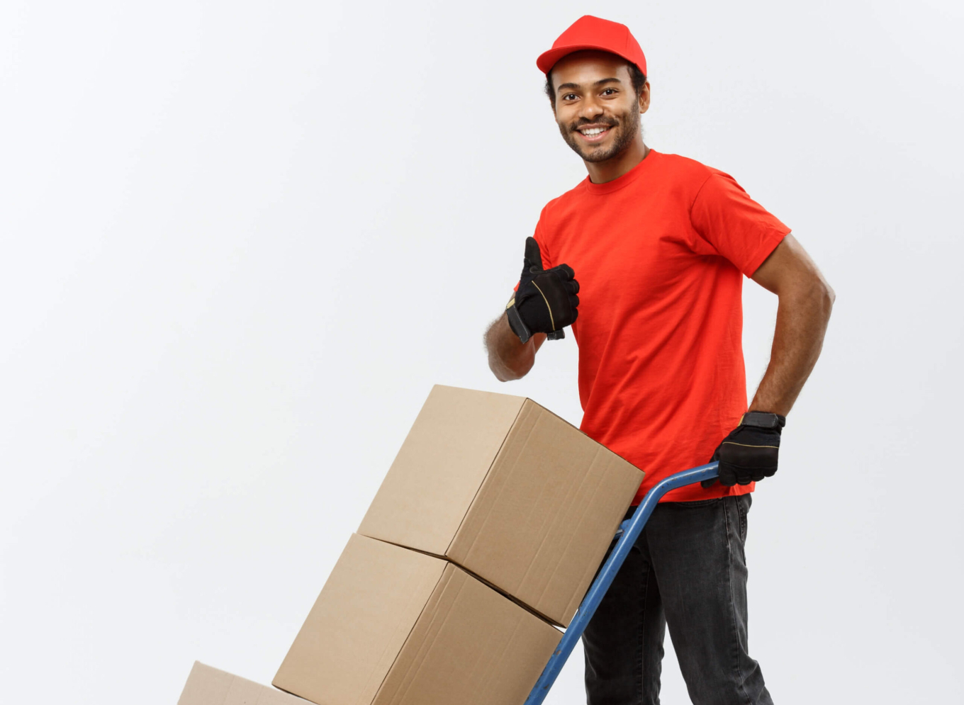 delivery-concept-portrait-handsome-african-american-delivery-man-courier-pushing-hand-truck-with-stack-boxes-isolated-grey-studio-background-copy-space (1) (1)